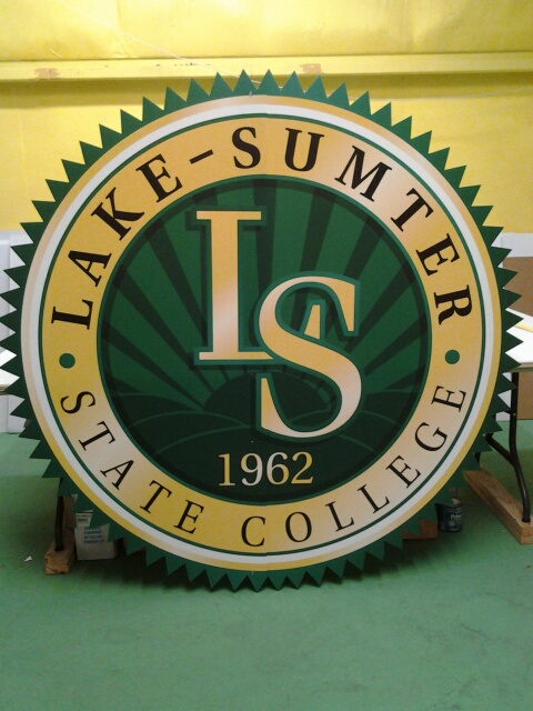 custom cardboard standup cutout display of a college seal -full color for events, parties, tradeshows